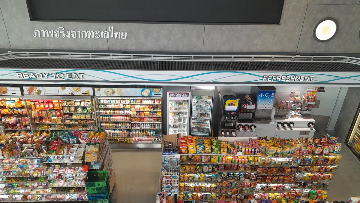 Shelves of snacks, drinks and ready-to-eat food inside a large 7-Eleven in Pattaya