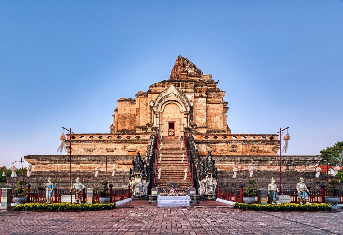 Ruined brick chedi of Wat Chedi Luang with its naga-lined stairway in Chiang Mai's Old City