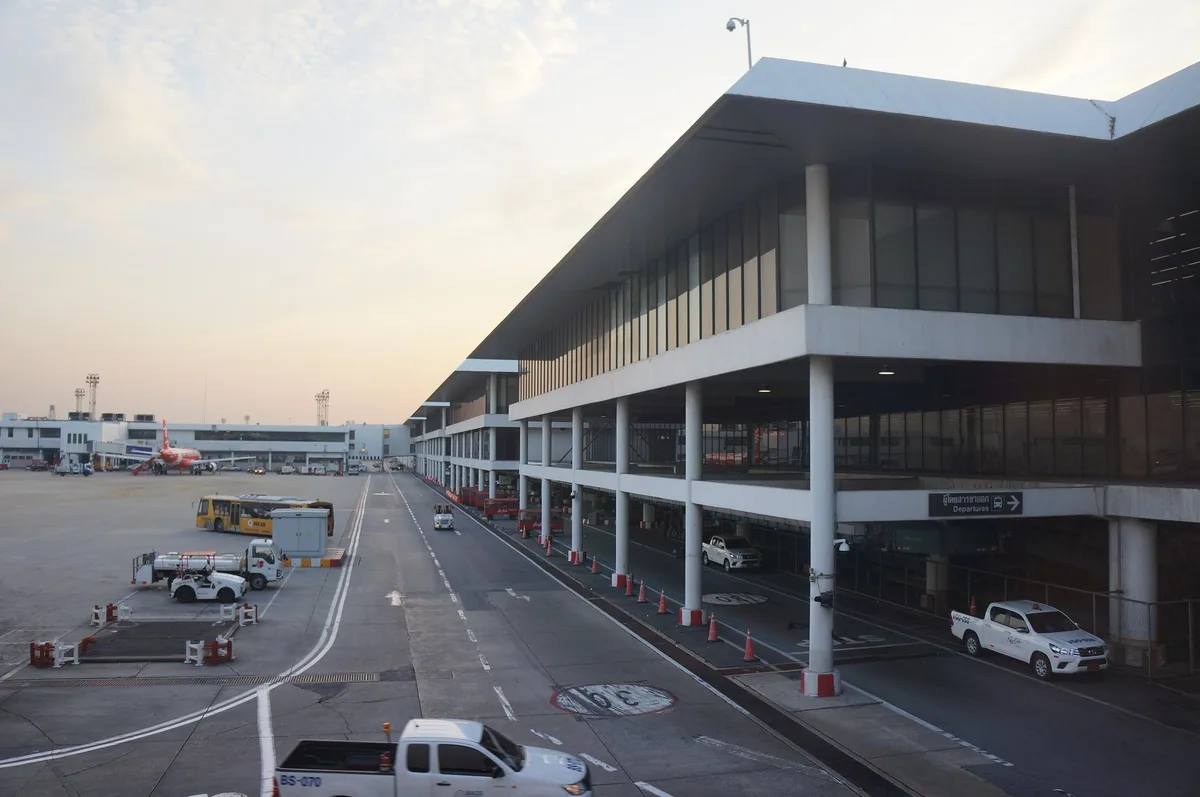 Kerbside road and multi-storey frontage of the international terminal at Don Mueang Airport