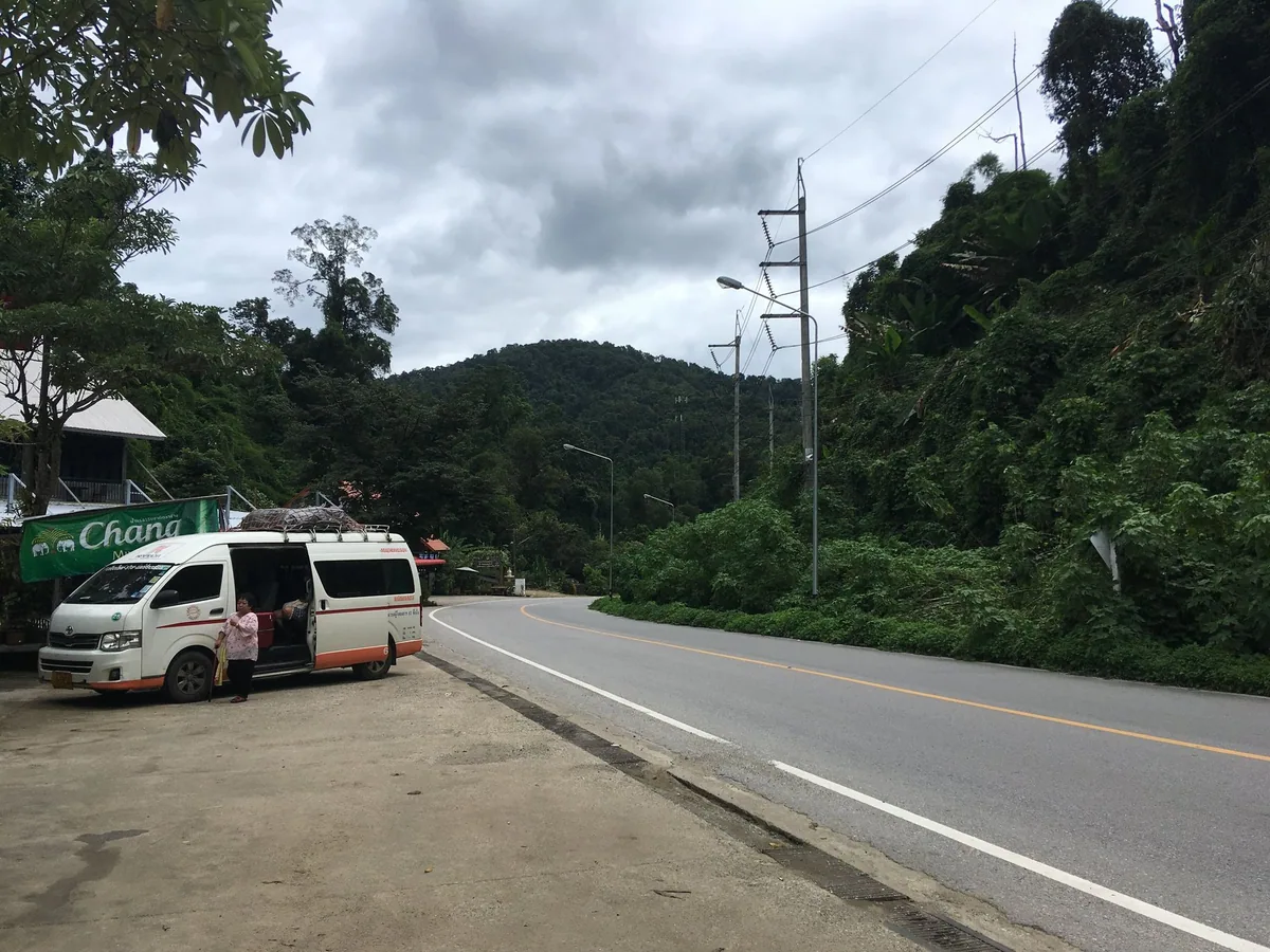 Minivan stopped beside Route 1095 in the forested hills between Chiang Mai and Pai