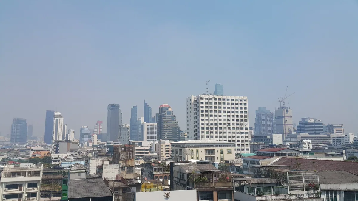 Bangkok's skyline fading into grey haze on a day of heavy air pollution in March