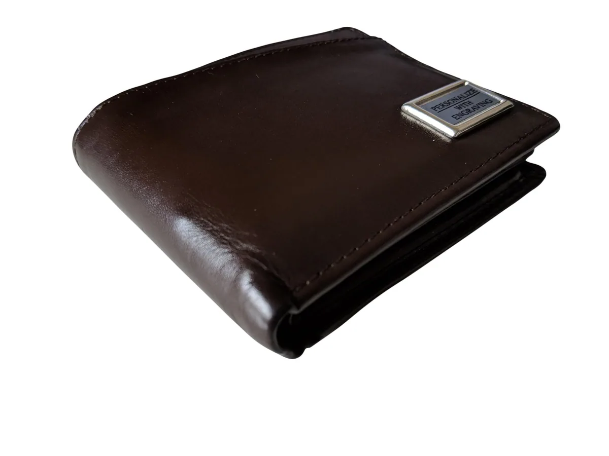 A brown leather men's wallet on a white background