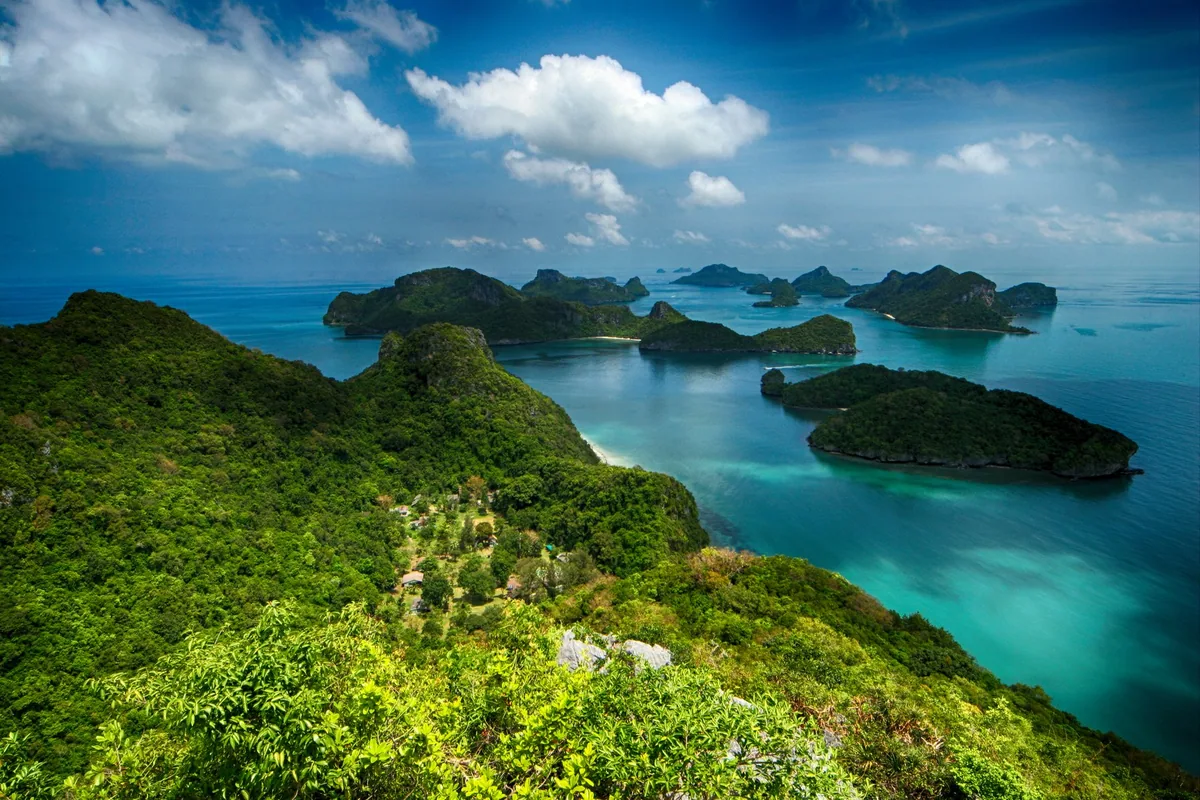 Dozens of forested islands scattered across turquoise sea in Mu Ko Ang Thong Marine Park
